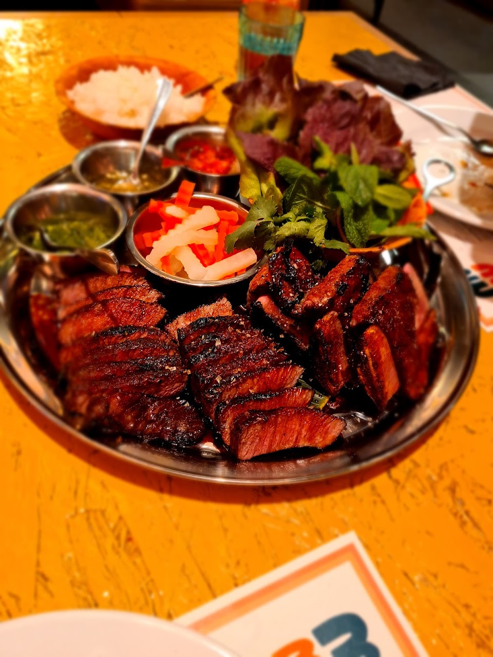 Grilled ribs and sambal sauces at MuMu